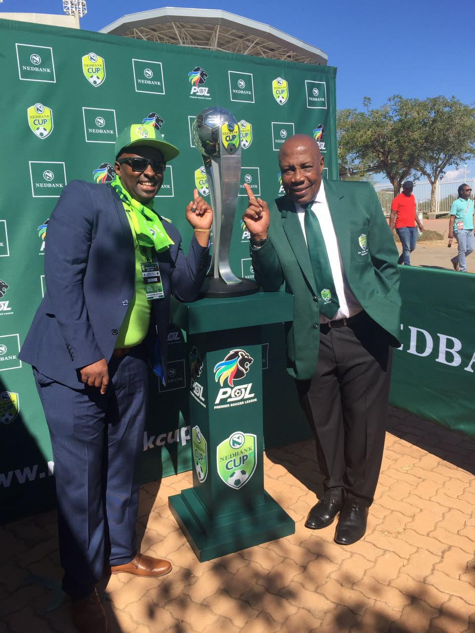 Shaaaaaaakes (Nedbank Ke Yona Coach) & Our Director with the Nedbank Cup Trophy Shaaaaaaakes (Nedbank Ke Yona Coach) & Our Director with the Nedbank Cup Trophy